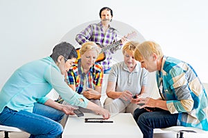 Senior people playing board games