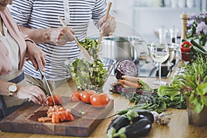 Senior people preparing healthy dinner