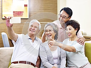 Senior people taking selfie