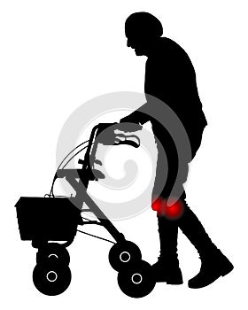 Senior person with knee pain and rollator