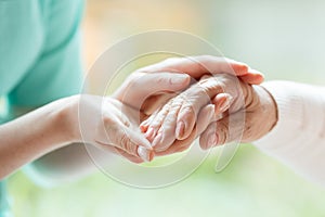 Senior person thanking the nurse