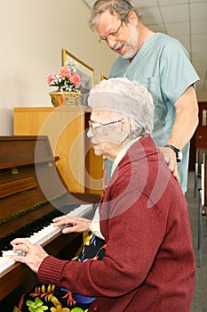 Senior playing piano