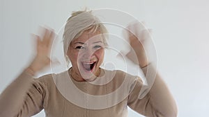 Senior portrait, happy old woman smiling and looking at camera