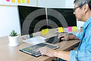 Senior programmer work with Developing programming