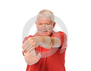 Senior retired man stretching