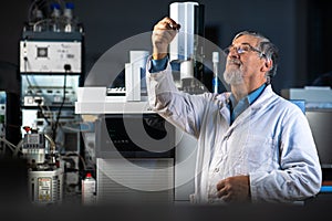 Senior scientist in a chemistry lab carrying out research