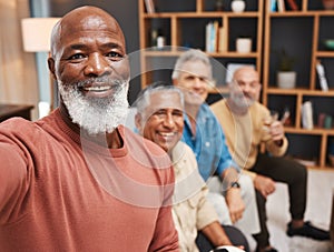 Senior, selfie and smile of black man with friends in house, having fun and bonding together. Portrait, retirement and