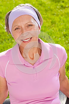 Senior sportive woman smiling outside portrait