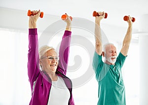 senior stretching exercise woman training lifestyle sport fitness home healthy gym exercising fit man couple team