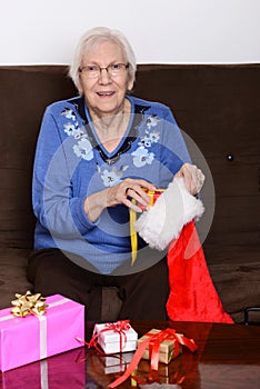 Senior stuffing christmas stocking