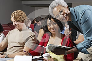 Senior Teacher And Students In Classroom
