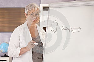 Senior teacher teaching chemistry