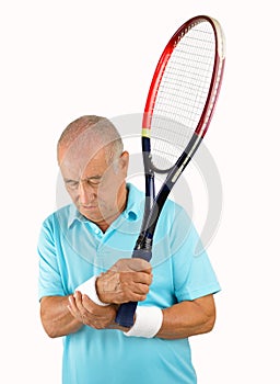 Senior tennis player with wrist pain
