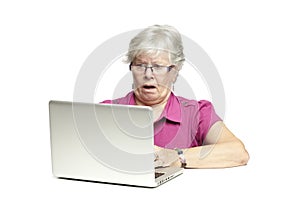 Senior using laptop