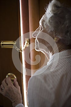 Senior using a security chain