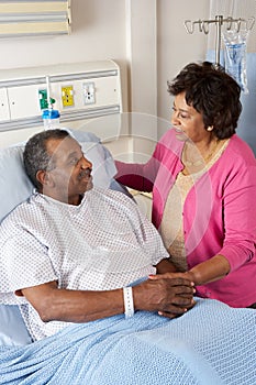 Senior Wife Visiting Husband On Ward