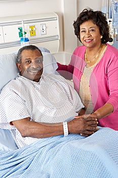 Senior Wife Visiting Husband On Ward