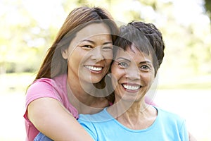 Senior Woman With Adult Daughter In Park