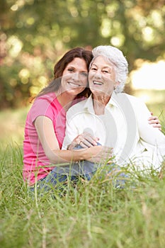 Senior Woman With Adult Daughter In Park