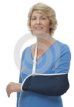 Senior woman with arm in sling
