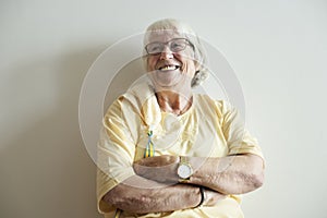 Senior woman arms crossed and smiling