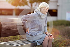 Senior woman with back pain