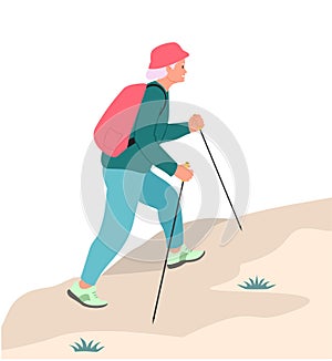 Senior Woman with Backpack hiking outdoor in park. Old lady walking with sticks. Woman walking Nordic style with sticks
