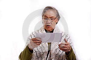 Senior woman with bills