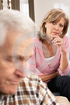 Senior Woman Caring For Sick Husband photo