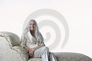 Senior Woman On Chaise Lounge