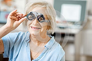 Senior woman checking vision