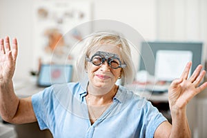 Senior woman checking vision