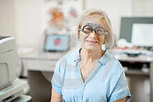 Senior woman checking vision