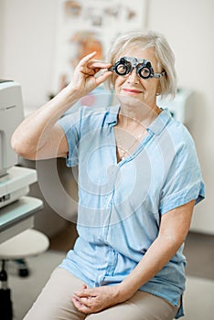 Senior woman checking vision