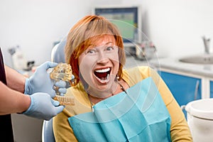 Senior woman in the dental office.