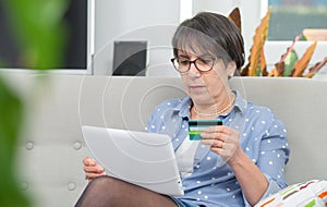 Senior woman doing online shopping