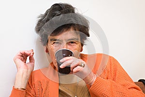 Senior woman drinking