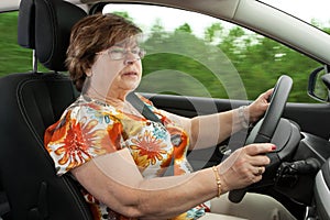 Senior Woman Driving a Car