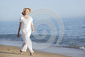 Senior Woman Enjoying Beach Holiday