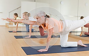 Senior woman exercising stretching workout