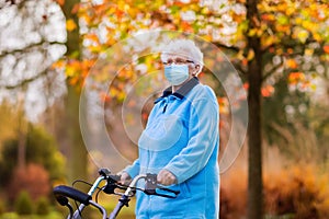 Senior woman in face mask. Virus outbreak photo