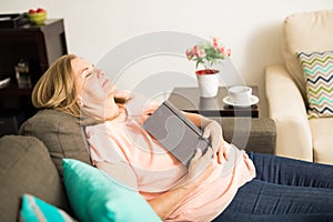 Senior woman fell asleep after reading