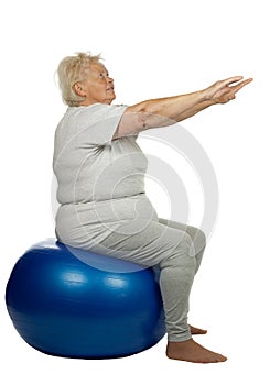 Senior woman with a fit ball
