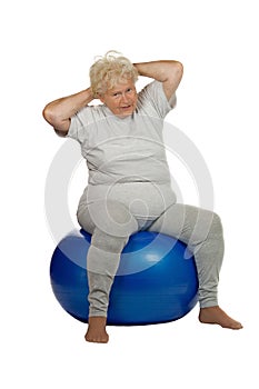 Senior woman with a fit ball