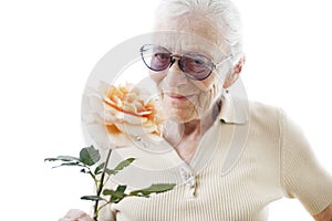 Senior woman with flower