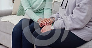 Senior woman, friends and holding hands in support, care or trust together in retirement or old age home. Closeup of