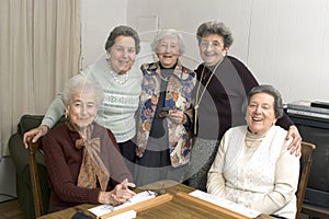 Senior woman at the game table