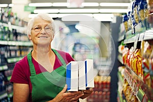 Senior woman in groceries store