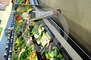 Senior woman grocery shopping