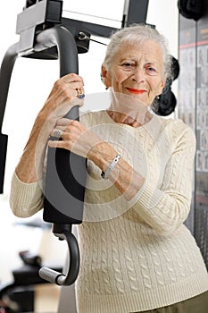 Senior woman in gym